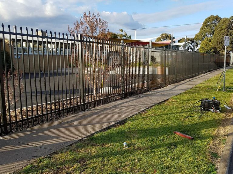 steel tubular fence steel tubular fence close up University Park Primary School st Albans Melbourne